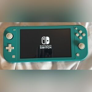 Nintendo Switch with Turquoise Frame